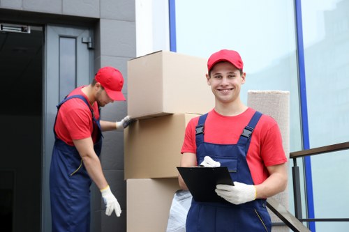 Careful loading of student belongings for a move in South West London