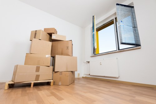 Professional apartment removals in Balham with boxes and furniture