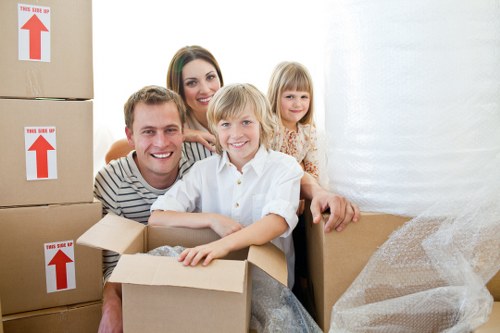 Packed moving boxes and furniture inside a hired removal truck