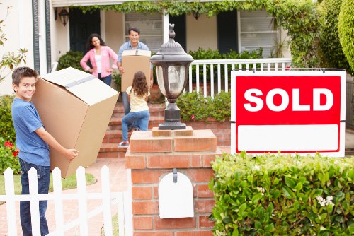 A well-organised house move in Balham with boxes, furniture, and moving equipment