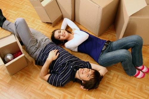 Professional man with van service loading items carefully